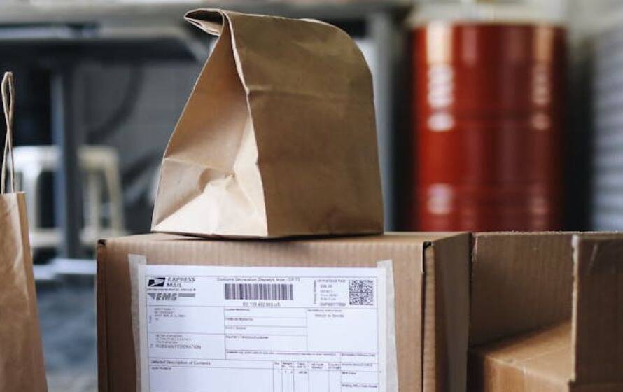 Moving boxes representing RCMP housing benefits and relocation support