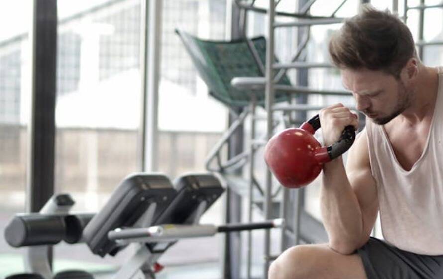 RCMP cadet performing kettlebell strength