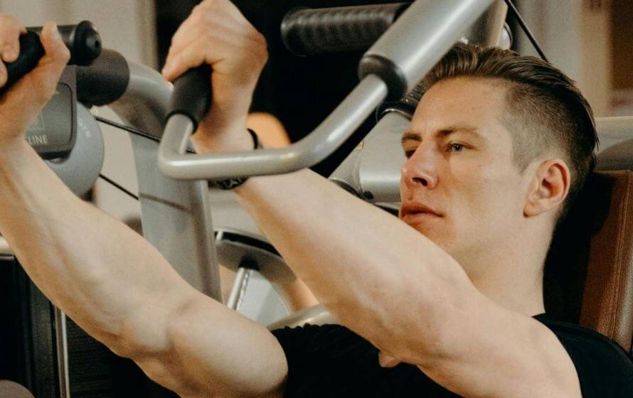 RCMP candidate performing upper body strength exercise during PFA workshop training