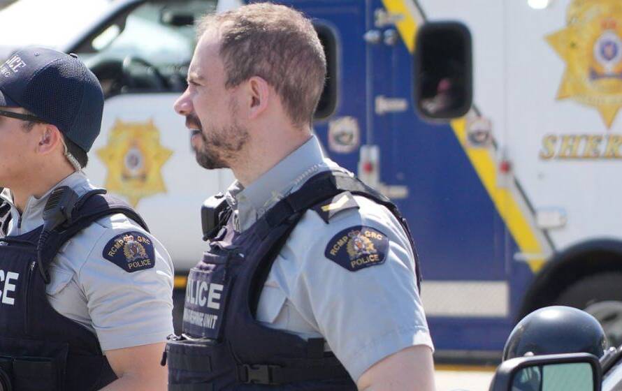 RCMP police officers on duty in Canada during a public safety operation, illustrating concerns about whether there is an RCMP shortage across the country.