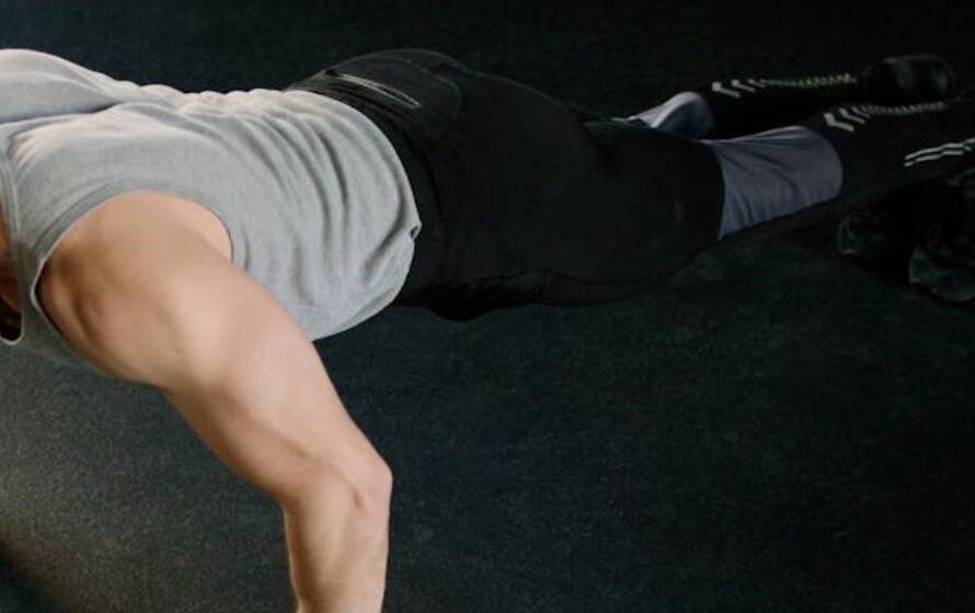 Female RCMP cadet performing push-ups during fitness test training