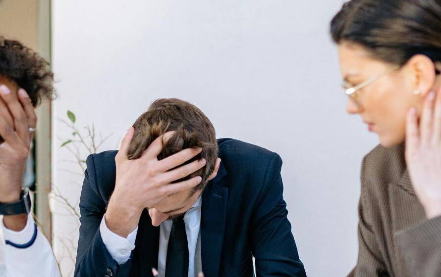 Group of professionals showing stress representing demands of RCMP career