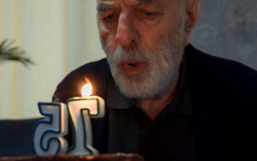 Older adult celebrating birthday representing RCMP age limit discussion